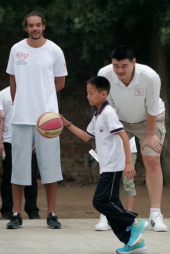 June 30th, 2012 - Yao Ming and Joakim Noah visit a  primary school for children of migrant workers at Changping District in Beijing