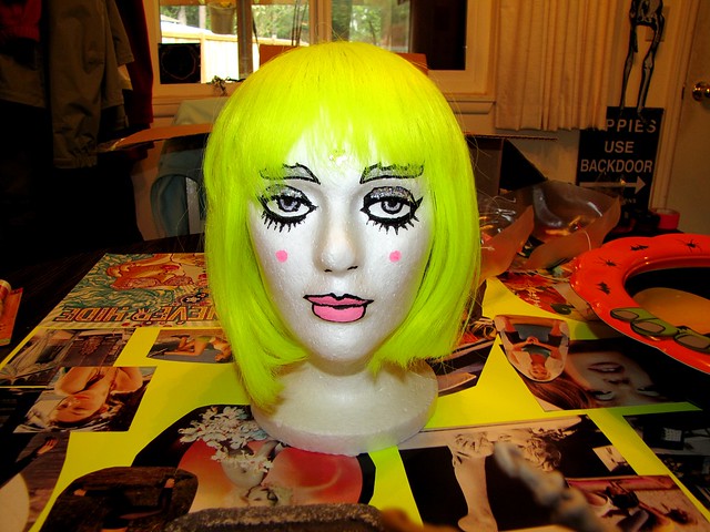 neon wig on wig head