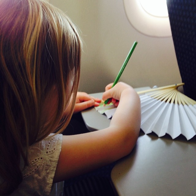 Keeping busy on the plane #paperfan #designyourown #spiralgarden