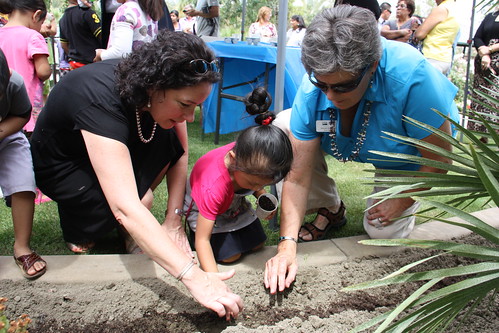 Deputy Under Secretary Patrice Kunesh (left) and California RD State Director Glenda Humiston join children and families to plant a community vegetable garden at Mountain View Estates.