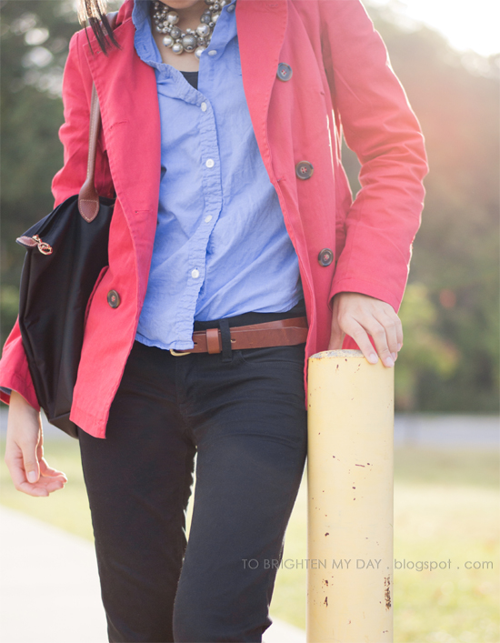 red trench, blue oxford shirt