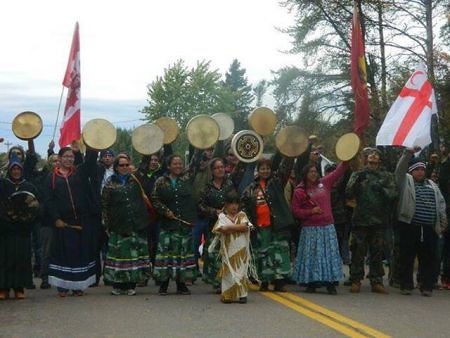 Native people in Canada blocking entrance to their lands in opposition to fracking. RCMP agents attacked the protest. by Pan-African News Wire File Photos