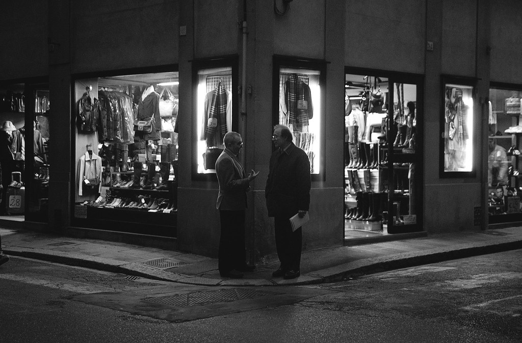 Men chatting on a corner, Florence