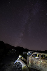 02468308-65-Classic Car Rusting Under Mojave Desert Milky Way-3