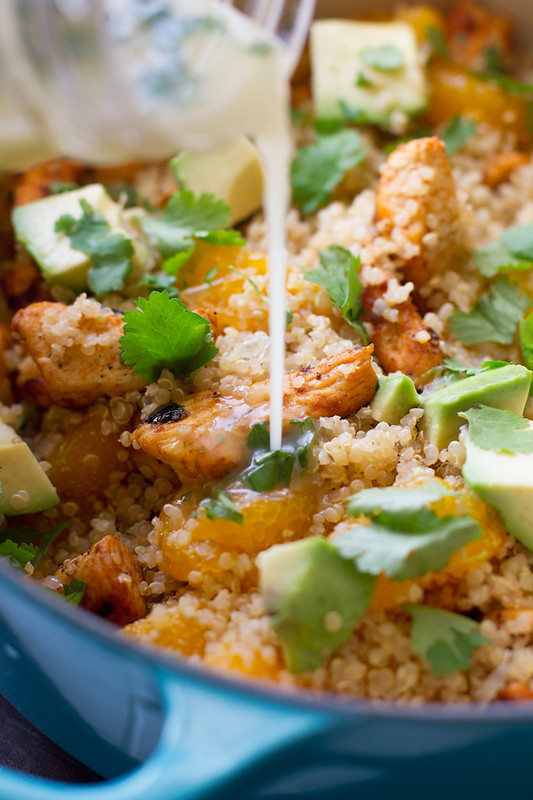 Light Citrus Chicken Quinoa Salad - A light and healthy citrus salad with creamy avocados, chunks of white meat chicken, mandarin oranges, and fresh cilantro. This chicken quinoa salad is so filling and still lighter on the calories! #chickensalad #quinoasalad #chickenquinoasalad #lightsalad | Littlespicejar.com
