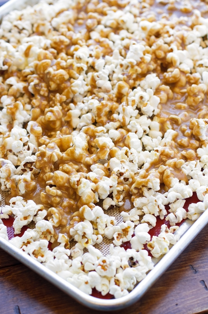 Homemade Caramel Corn - buttery and loaded with caramel this is the perfect movie night treat + it's perfect for gift giving! #popcorn #caramelcorn #gourmet #dessert | littlespicejar.com