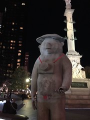 Bear statue wearing hat and camera at #ColumbusCircle