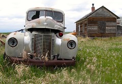 International Harvester truck  and farm building.  Montana