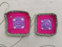 Two flamboyant afghan squares made with the same yarn