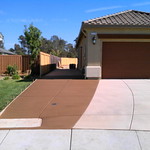 Driveway extension with colored concrete.