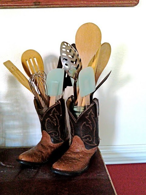Be creative and put jars in your old, but still favorite boots and store the kitchen utensils