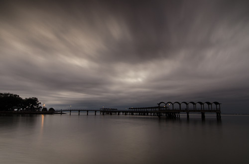 storm reflection water silhouette clouds jekyllislandga fishingpiersunset