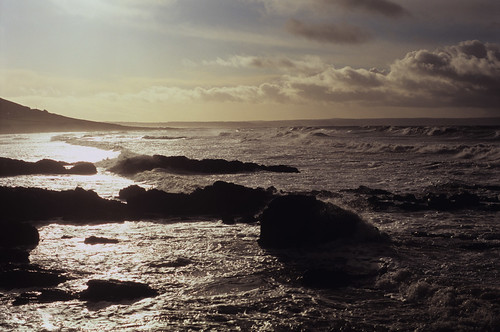 sun film clouds reflections landscape 50mm coast ross rocks surf minolta devon existinglight xd11 jurassic merritt croyde
