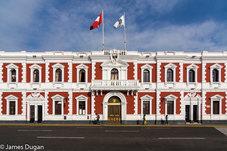 The bright Municipalidad de Trujillo to the south of Plaza de Armas de Trujillo
