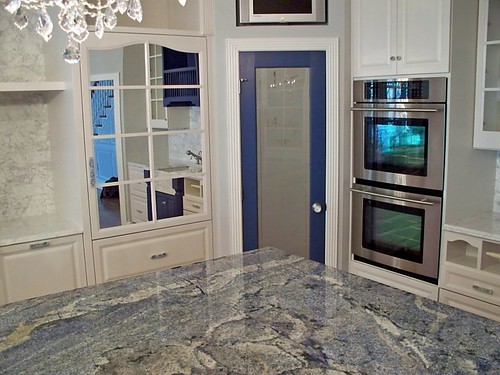 mirrored fridge, integrated fridge, paneled fridge, hidden fridge, fridge furniture, hidden refrigerator, glass pantry door, corner pantry, blue bahia