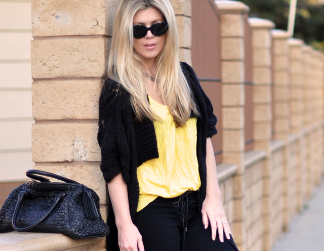 black jeans and  sweater with  yellow tank- hair 