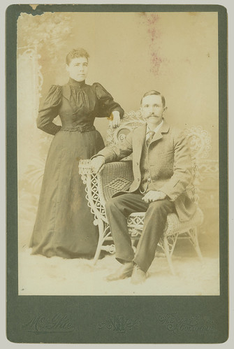 Cabinet Card pair with wicker chair