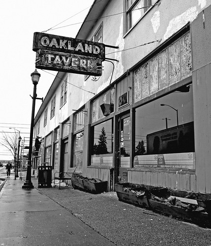 street old city light people urban usa classic lamp sign architecture bar america grit oakland photo washington neon angle post state image united picture center scene gritty historic neighborhood photograph tavern madrona local states roadside venue