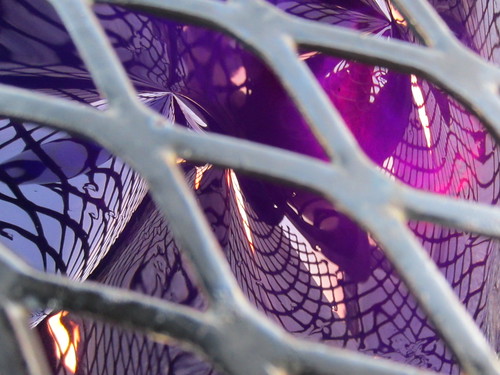 abstract color reflection geometric colors lines metal closeup grid lights design shiny pattern shine purple distorted random geometry top under violet cage overlay wiggly diagonal plastic reflected layers psychadelic crisscross wavy grape depth ravens druidhill druidhillpark moorishtower outerspaces outerspacesbeyondbaker