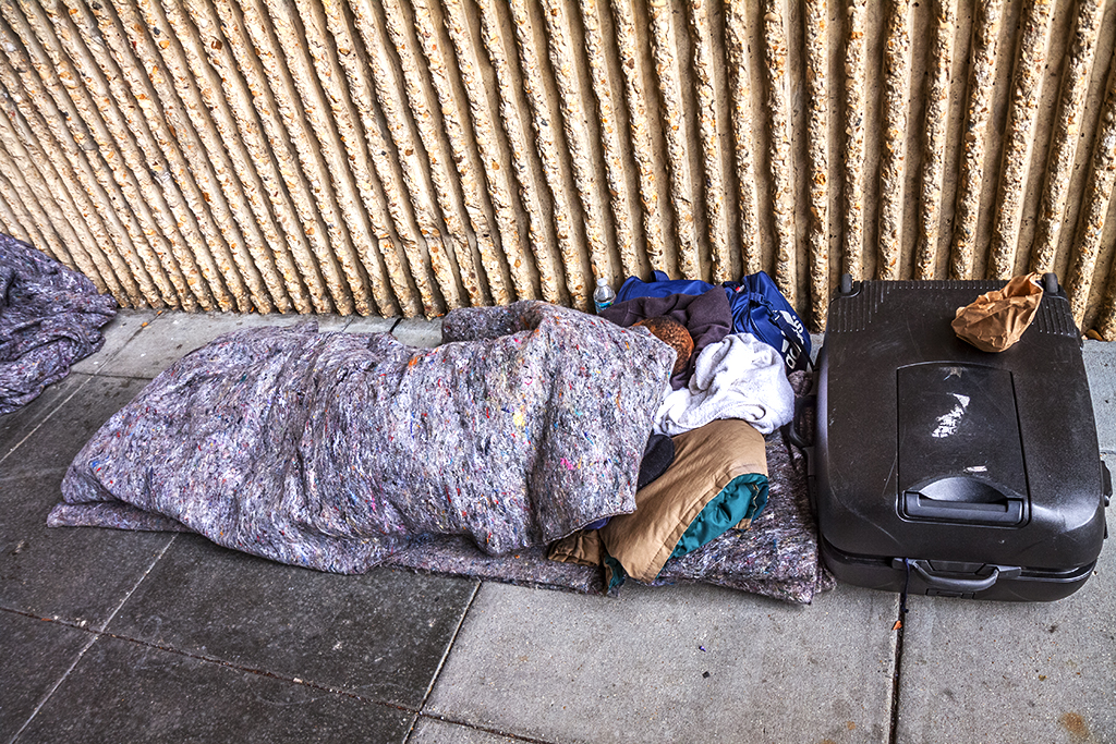 Man-sleeping-on-sidewalk-near-Union-Station-on-11-30-11--Washington