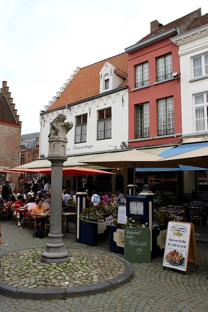 statue and cafes on square