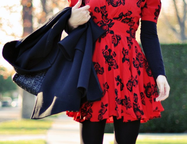 red dress with roses print - black coat -tighst-bag