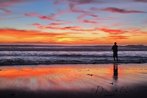 sunset people reflection beach water fishing waves