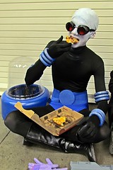 Mr. Freeze eating cold pizza