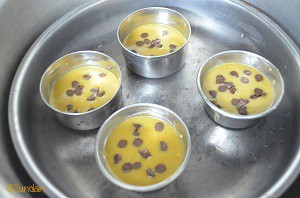 how to make muffins in pressure cooker - place all the muffin moulds in the baking plate