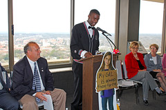 Former foster youth Gaby Edouard speaking during the keynote event in the west wing of the twenty-second floor of the Capitol during Guardian ad Litem Day on February 9, 2012 in Tallahassee, Florida.