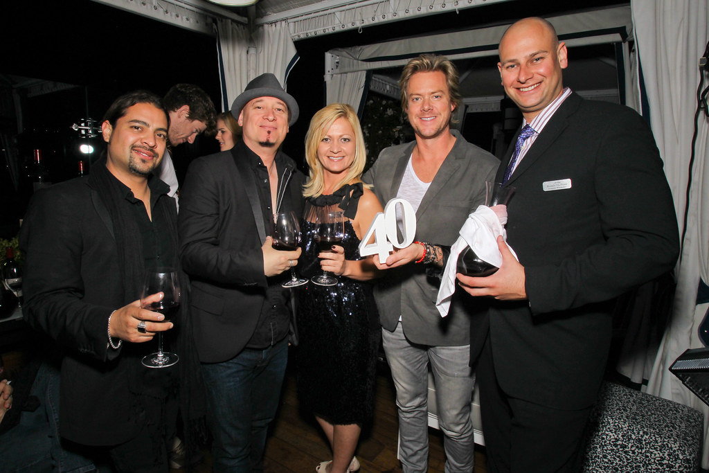 Hector Maldonado, Jimmy Stafford and Scott Underwood of Train with Lori Green and Ronald du Preez of Jordan Winery - Jordan Vineyard & Winery's 40th Anniversary, held on The London Hotel rooftop in West Hollywood, California, USA on Monday, April 23, 2012