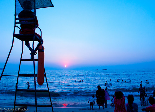 blue sunset sea people orange sun india reflection beach water silhouette canon children fun women waves indian goa lifeguard bathing canon500d watchingover thechallengefactory herowinner malayapradhan malayakpradhan