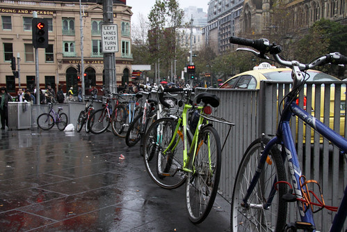 Bikes chained up outside Flinders Street Station