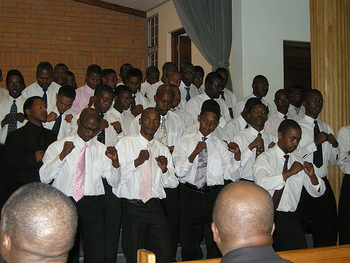 Bryn Mawr Presbyterian Church Choir watches a township choir perform in Khayelitsha near Cape Town