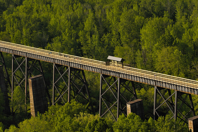 Interpreter Bob Flippen takes visitors on a tour under the bridge at High Bridge Trail State Park, Virginia