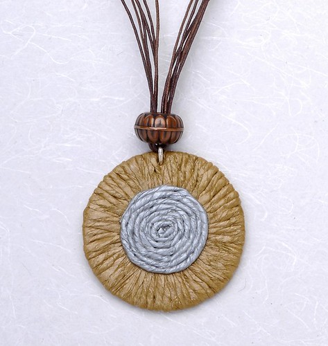 beige and brown disc necklace pendant 