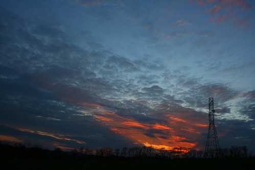blue sunset red orange sun silhouette twilight pylon