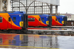 12-102  Three South West Trains Class 455s at a wet Waterloo
