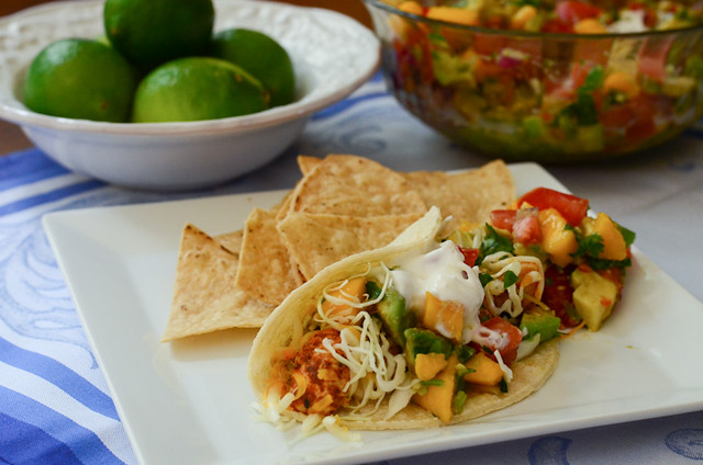 Chicken Tacos with Mango Avocado Salsa on a plate with tortilla chips.