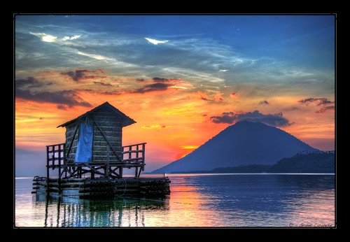 blue red sky sun water yellow sunrise silver indonesia landscape volcano fishing hut hdr bunaken palafitte giannicicalese