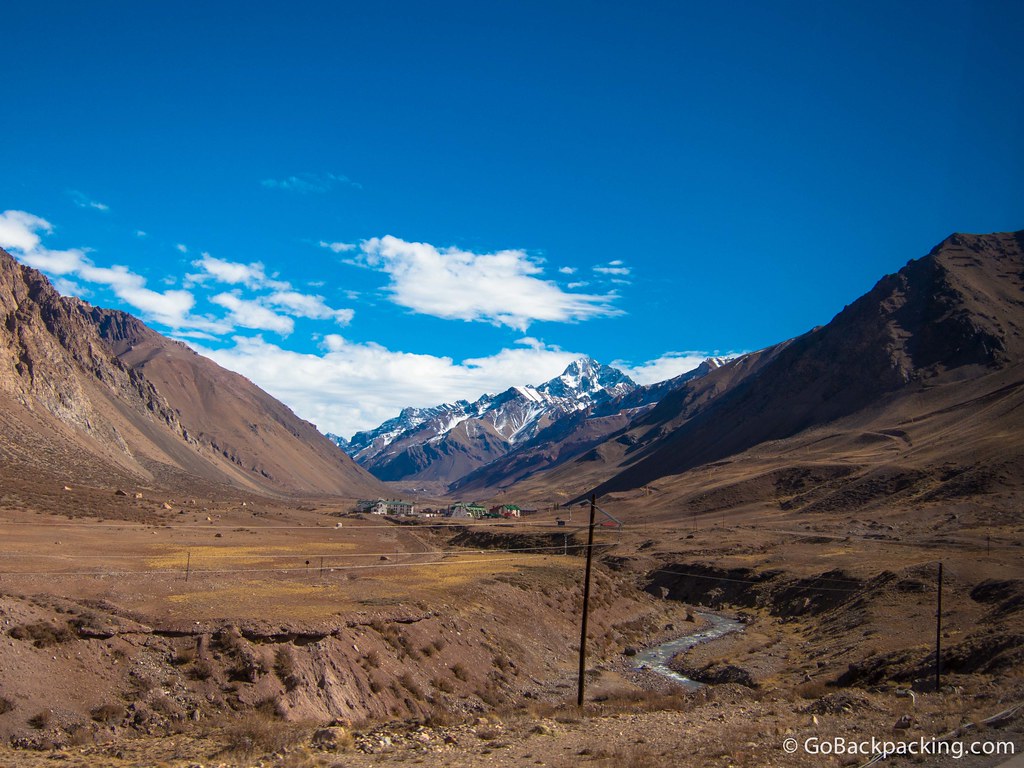 A ski resort nestled in a valley awaits the winter snow.