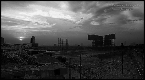 light blackandwhite bw sun india station clouds sunrise canon buildings landscape garbage horizon tracks railway bombay mumbai filth hdr slums 1000d canon1000d ishanaranjikal