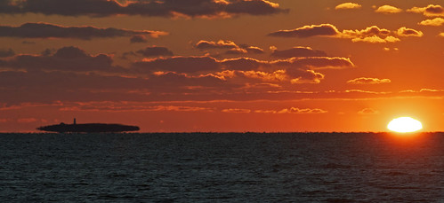 ocean statepark park sunset red sea orange usa sun lighthouse building beach water strange yellow skyline night clouds catchycolors landscape outside island coast boat photo seaside interesting nikon flickr waterfront image outdoor connecticut clinton horizon shoreline picture newengland ct places ufo madison midair unusual scenes hammonassett buoy gundersen longislandsound guilford conn hammo faulkners nikoncamera lisound sunhalo meigspoint hammonassetbeachstatepark buoyant hammonassetbeach d5000 connecticutscenes nikond5000 bobgundersen robertgundersen pwpartlycloudy stewartbmckinneywildliferefuge