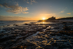 Bamburgh Castle from Rock Pools at Sunrise