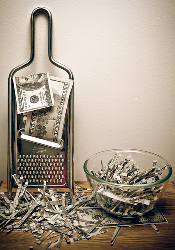 Shredding money (Some rights reserved by Tax Credits on Flickr)