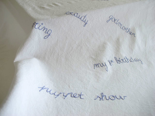 Details of an embroidered table towel