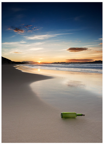sunset sea sky españa sun sol beach water clouds canon atardecer reflecting mar bottle spain sand agua playa arena cielo nubes reflejo cantabria botella loredo 400d canon400d