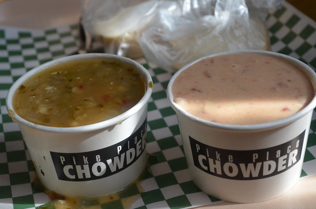 Two small cups of soup on a tray.