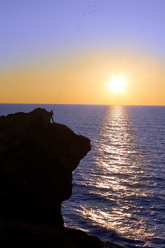 sunset sea sol canon mar fisherman rocks do por pescador rocha 1100d