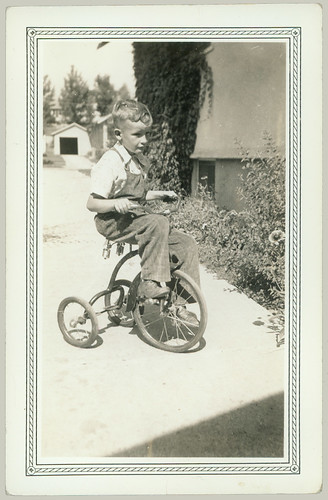 Boy with tricycle